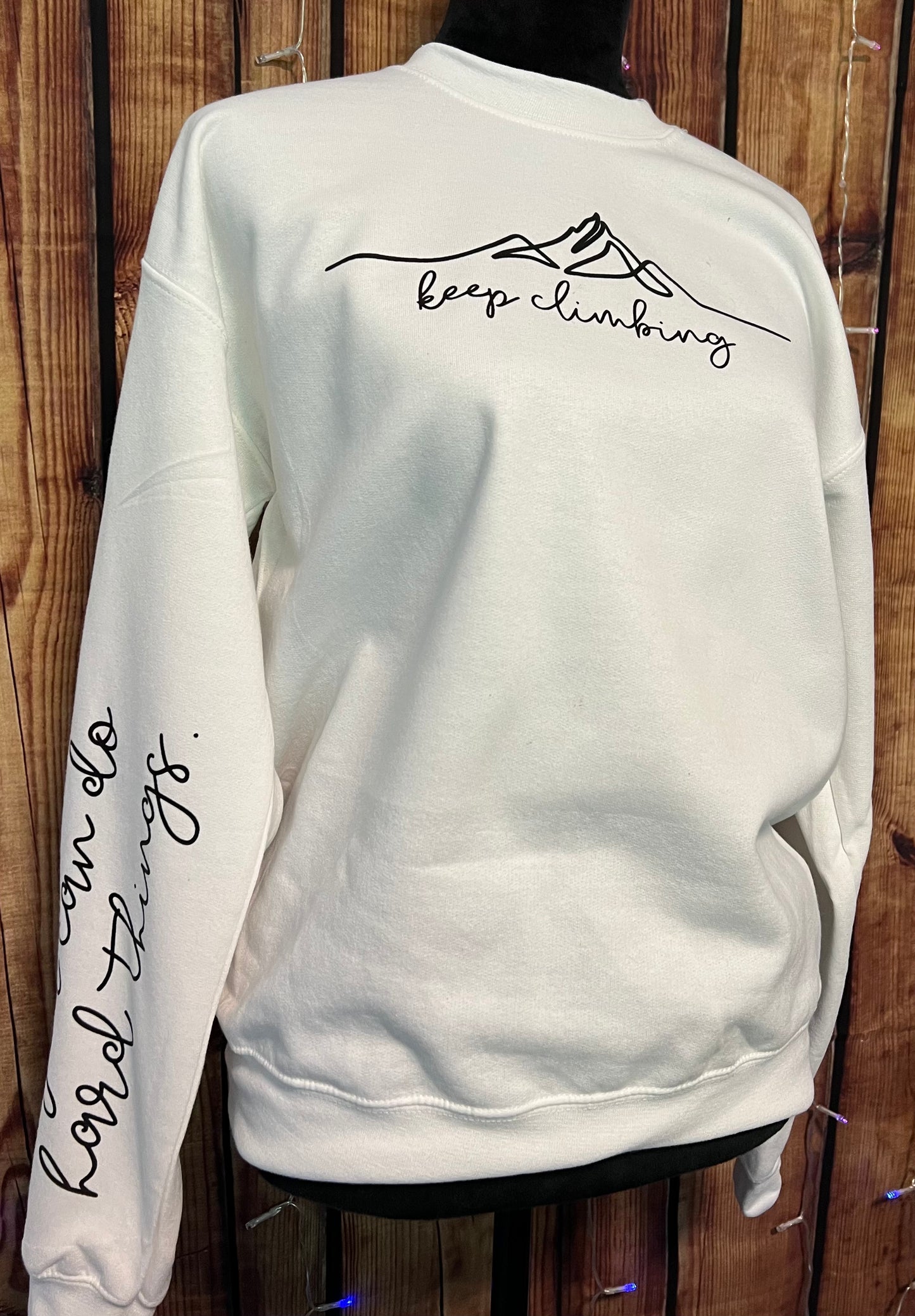 Keep climbing crew neck sweater